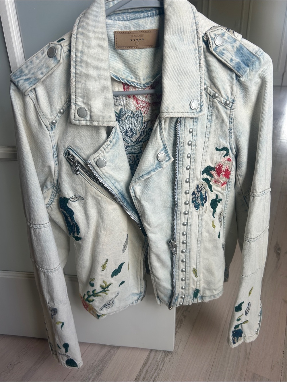 Blank NYC Light Wash Denim Moto Jacket with Floral Embroidery